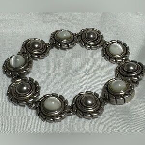 Silver Toned Bracelet with White Cat Eye Stones‎
